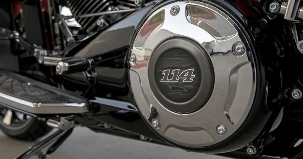 Example of a Harley 114 engine with chrome and black carbon fiber casings on the side of the engine