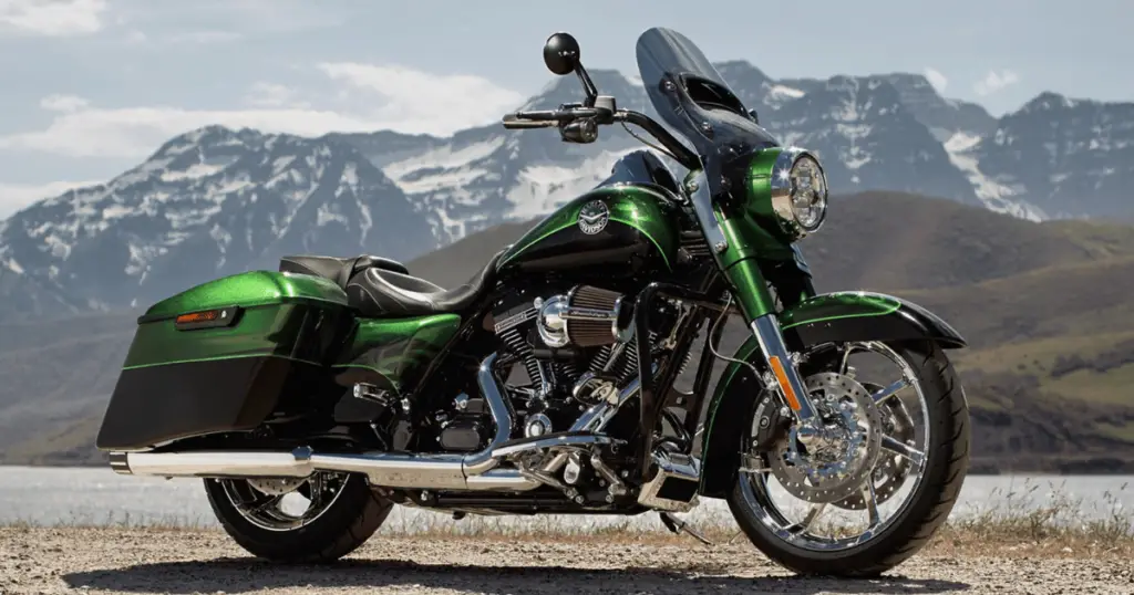 Green CVO Street Glide in front of a mountain range